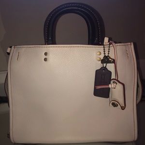 Coach White Chalk / Brass. Used